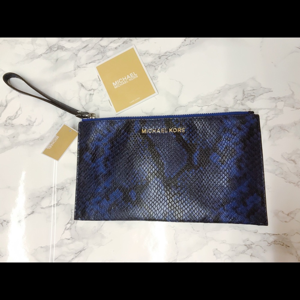 Michael Kors animal print xl wristlet